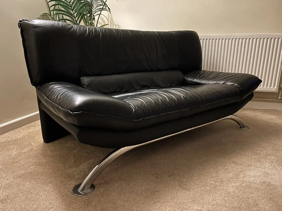 DFS Vintage Nicoletti Italian stylish sofa Black leather with curved chrome legs