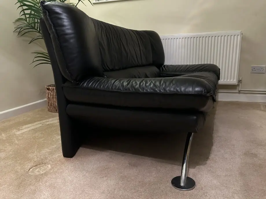 DFS Vintage Nicoletti Italian stylish sofa Black leather with curved chrome legs