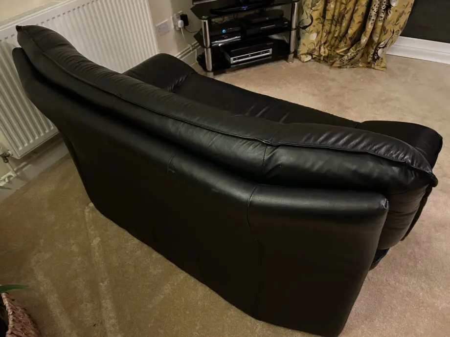 DFS Vintage Nicoletti Italian stylish sofa Black leather with curved chrome legs