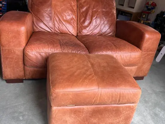 DFS tan 2 seater with pouffe