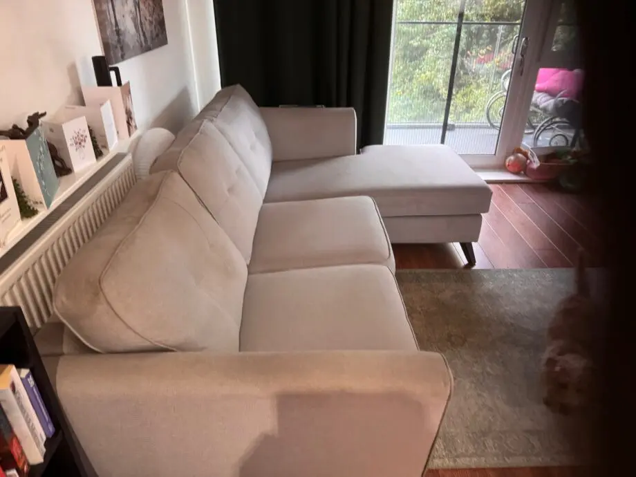 A grey 3 seater corner sofa