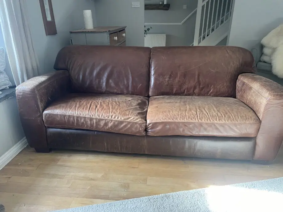 Vintage brown old leather sofa x 2