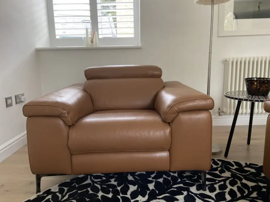 Leather reclining three seater sofa and chair
