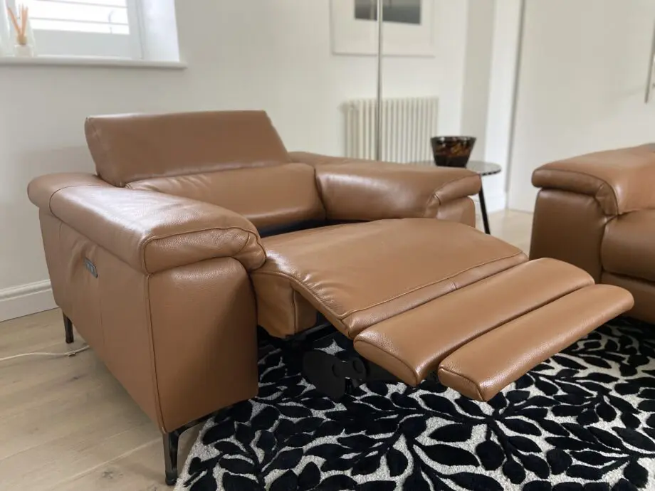 Leather reclining three seater sofa and chair