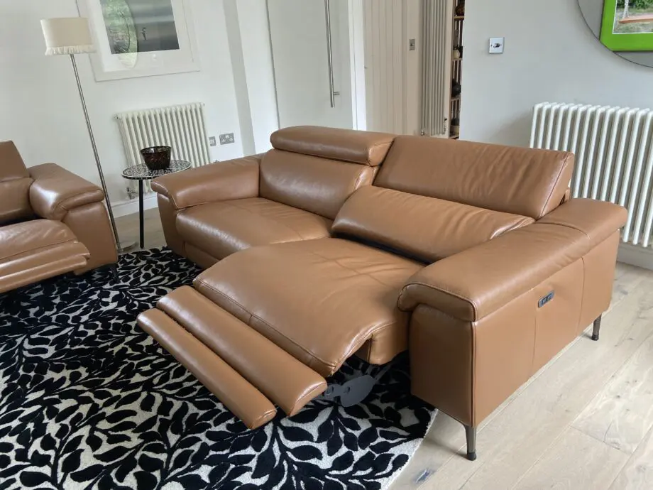 Leather reclining three seater sofa and chair