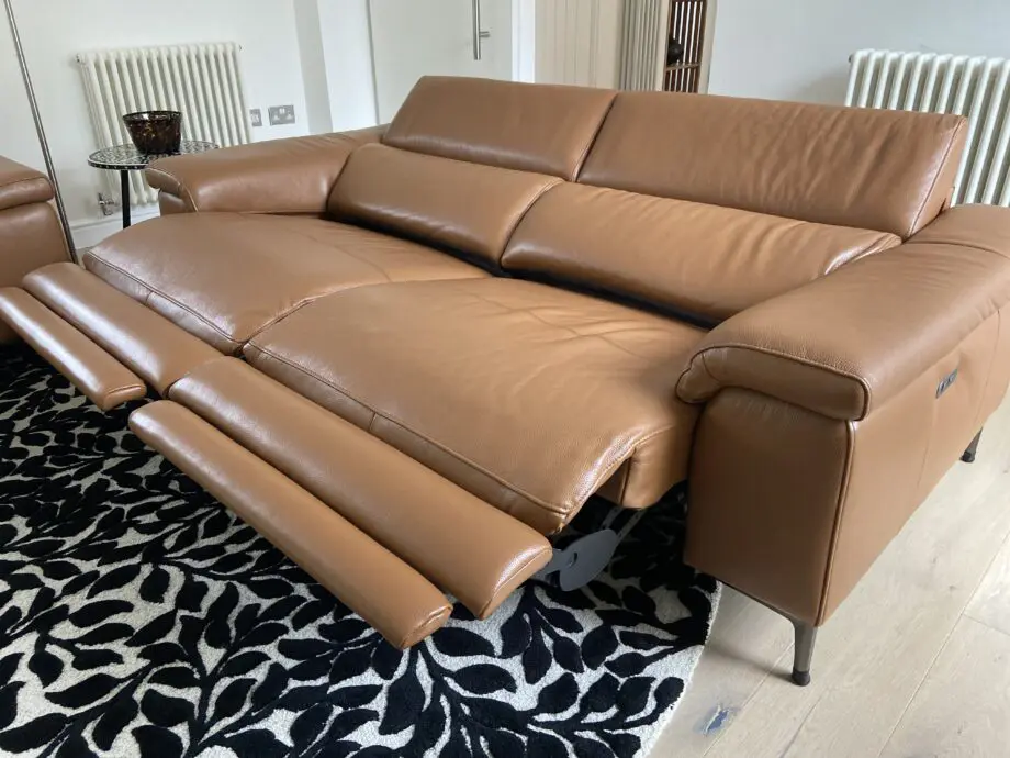Leather reclining three seater sofa and chair