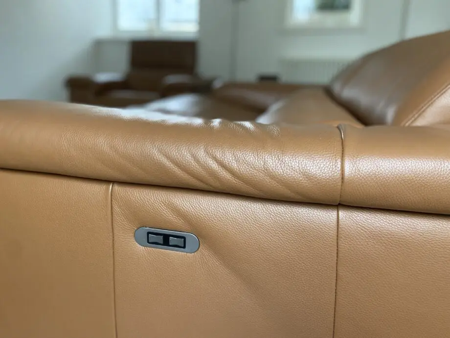 Leather reclining three seater sofa and chair