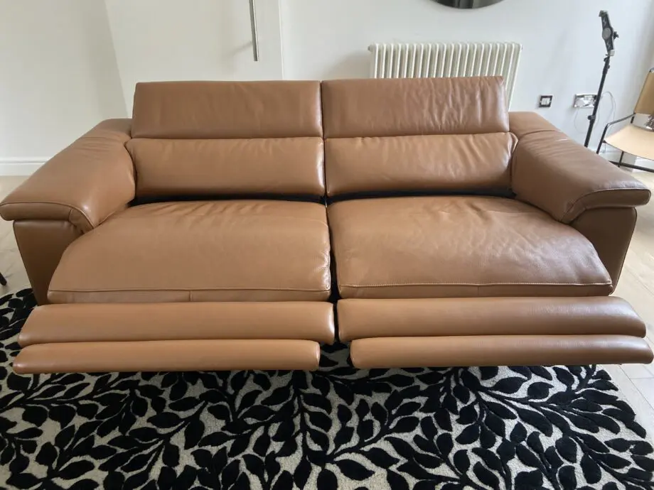 Leather reclining three seater sofa and chair