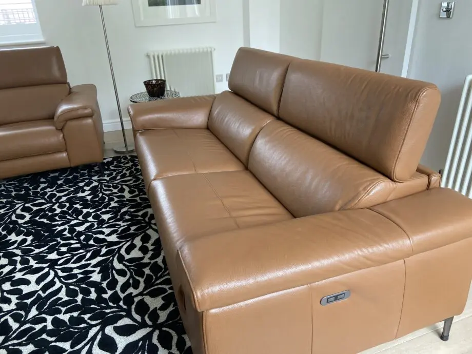 Leather reclining three seater sofa and chair