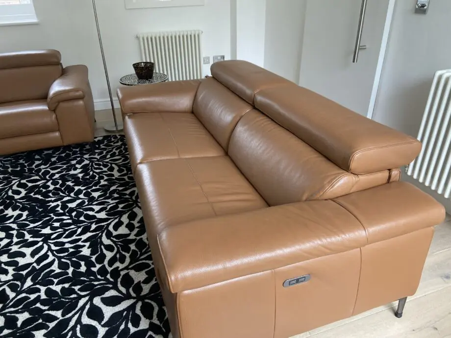 Leather reclining three seater sofa and chair