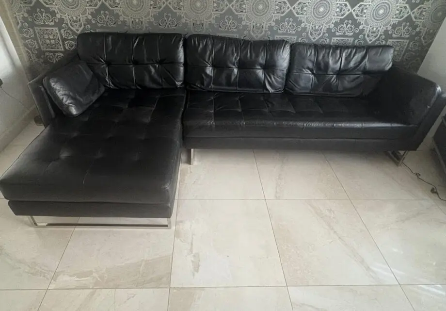 Dwell black leather L-Shaped sofa