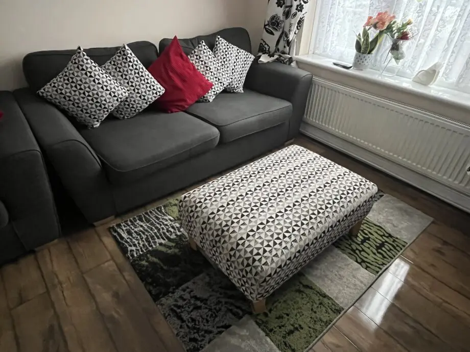 DFS charcoal sofa, two sofa chair and a footstool.