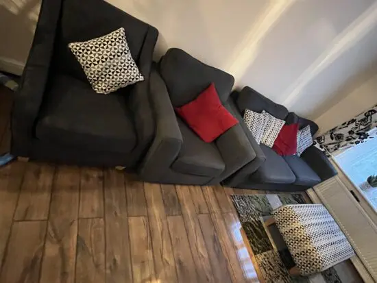 DFS charcoal sofa, two sofa chair and a footstool.