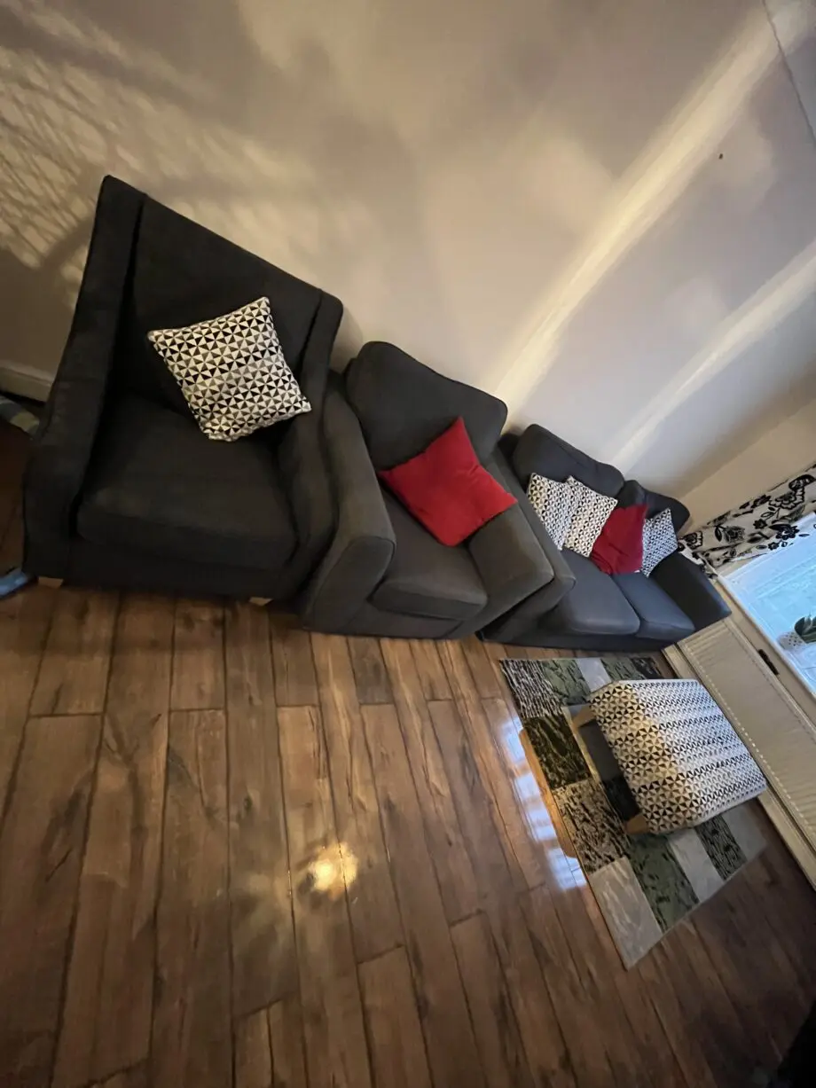 DFS charcoal sofa, two sofa chair and a footstool.