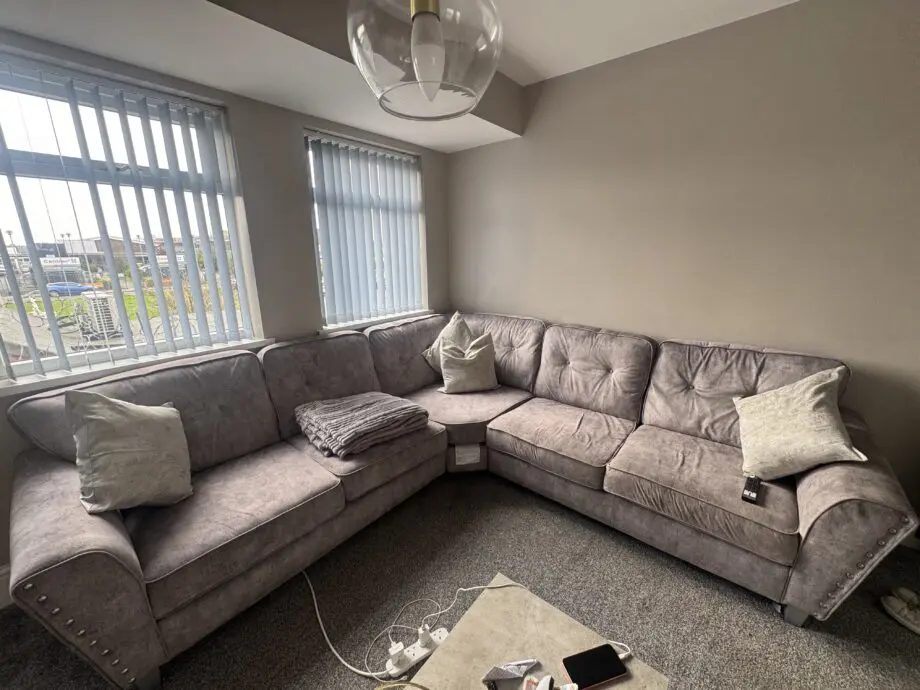 Grey velvet corner sofa