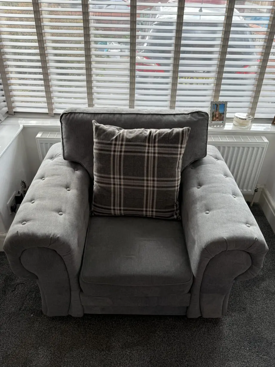 Grey Chesterfield style sofa and arm chair