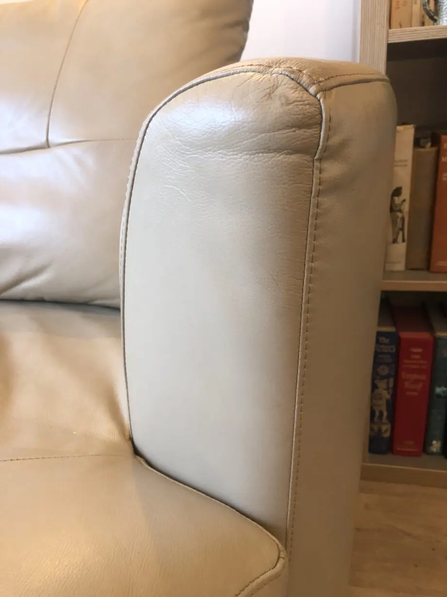 Beige leather swivel cuddle chair love seat round