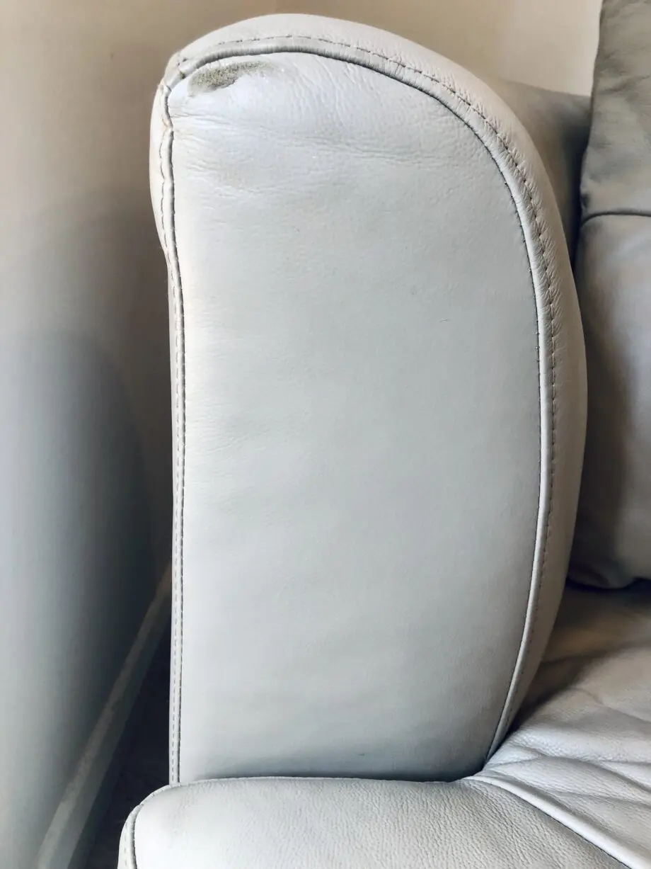 Beige leather swivel cuddle chair love seat round