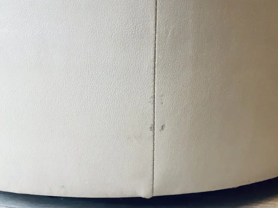 Beige leather swivel cuddle chair love seat round