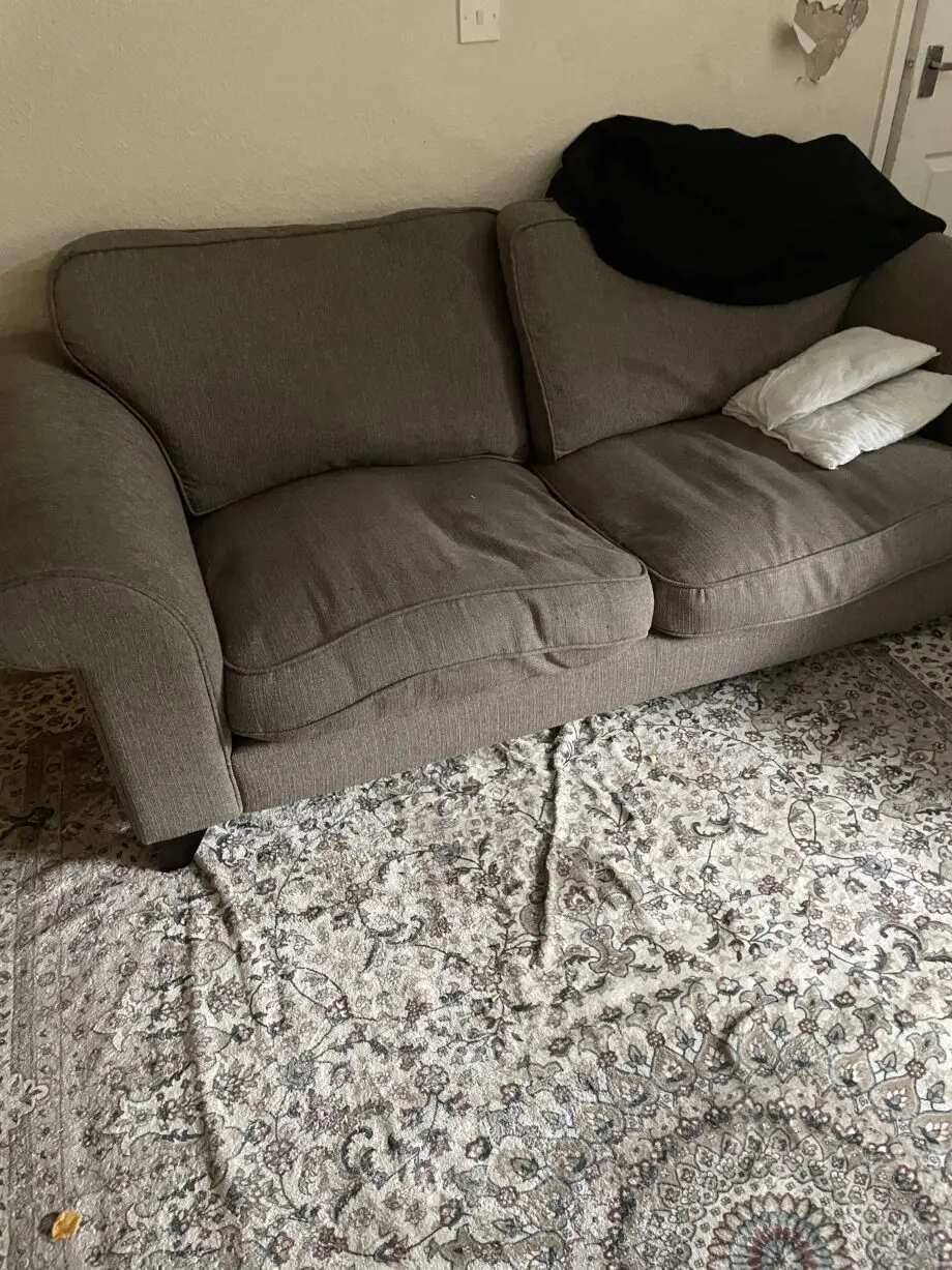 Three sofas two similar and one leather