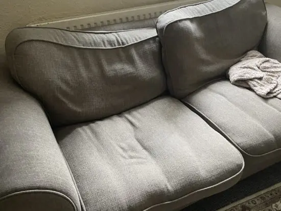 Three sofas two similar and one leather