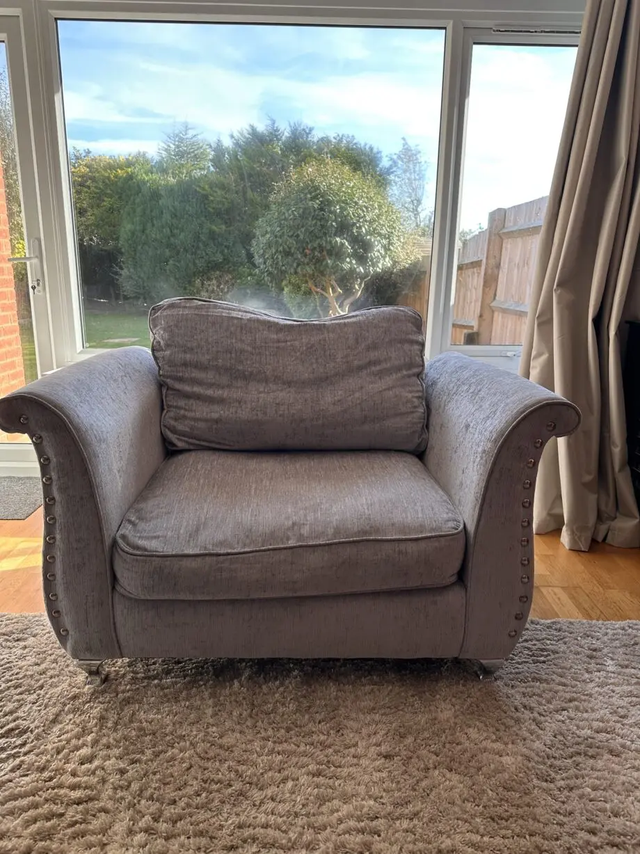 Grey 3 seaters and 1 seater sofa and 1 footstool