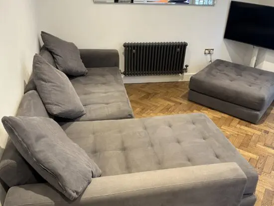 Large corner sofa with pouffe from Darlings of Chelsea