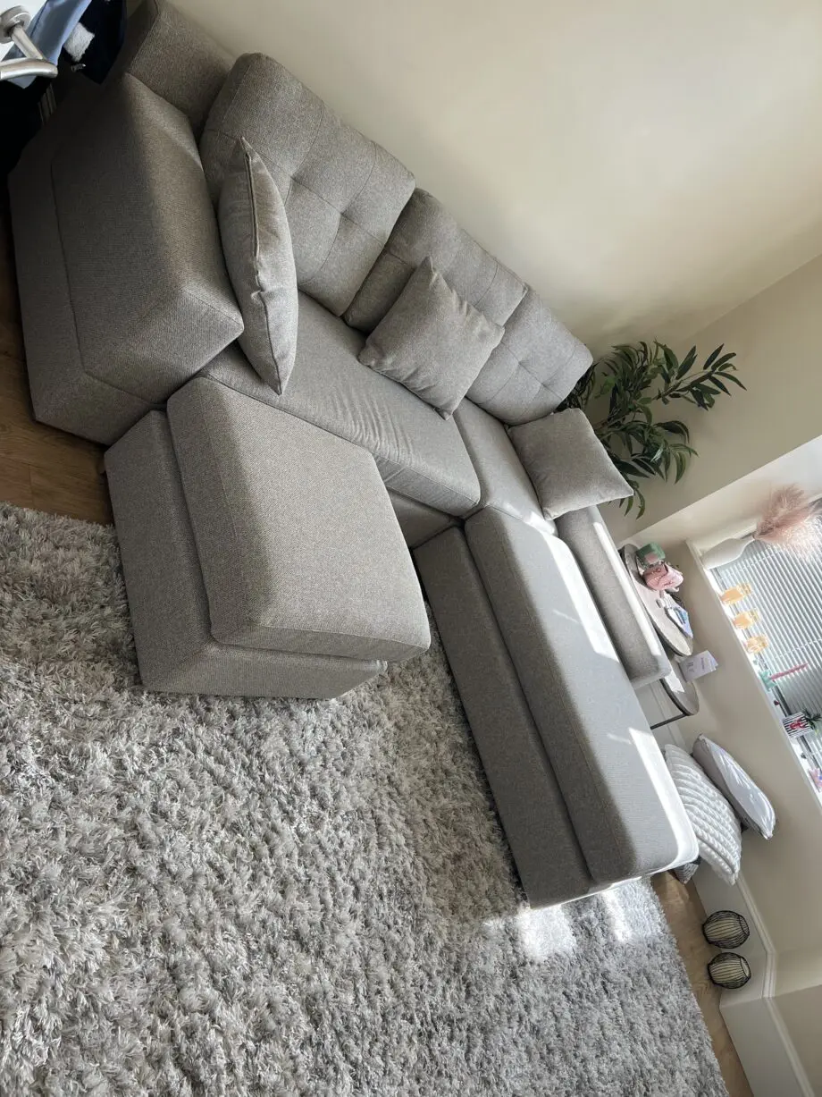 DFS Spinn Right hand facing 3 piece swivel sofa bed chaise