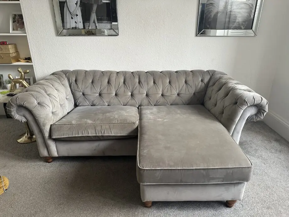 2 grey velvet Chesterfield sofas 1 with Chaise