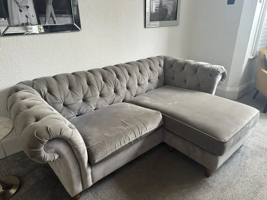 2 grey velvet Chesterfield sofas 1 with Chaise