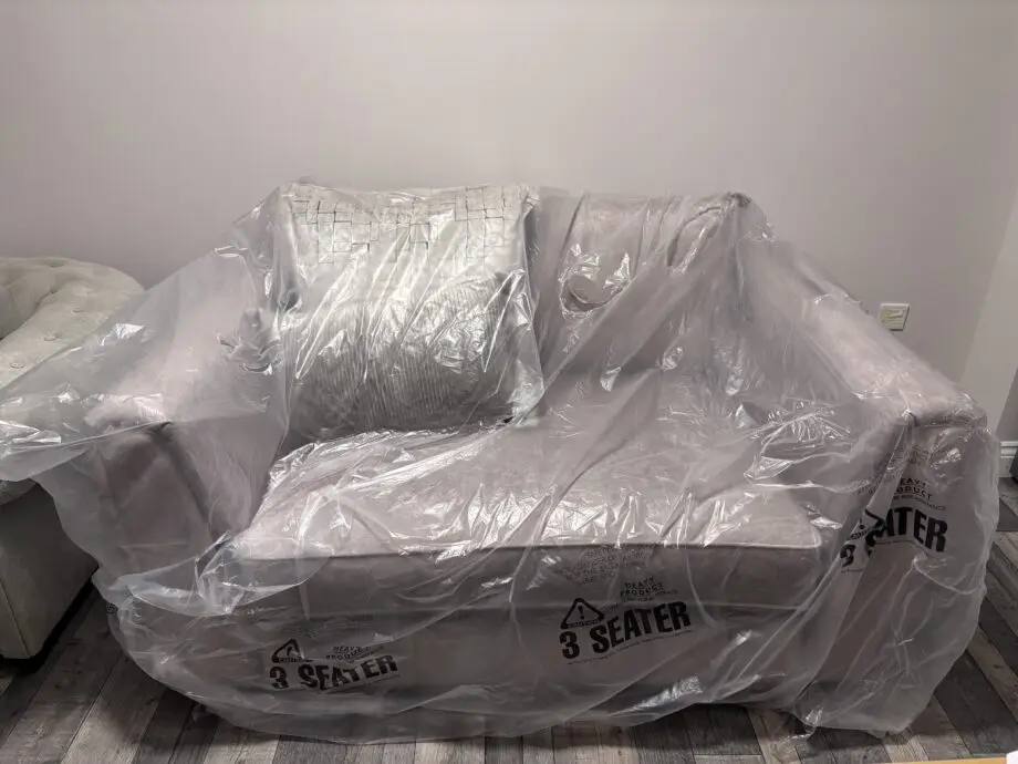 DFS Cherished formal back cuddler sofa in Oatmeal colour