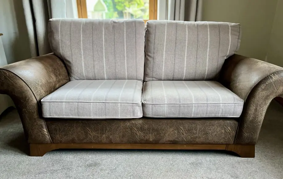 Marks and Spencers faux leather and fabric mix 3 seater sofas