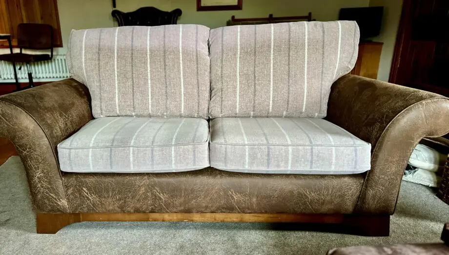 Marks and Spencers faux leather and fabric mix 3 seater sofas