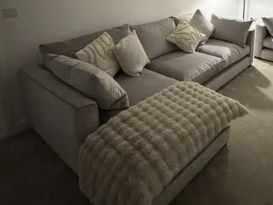 DFS grey kaizer chaise sofa and pouffe