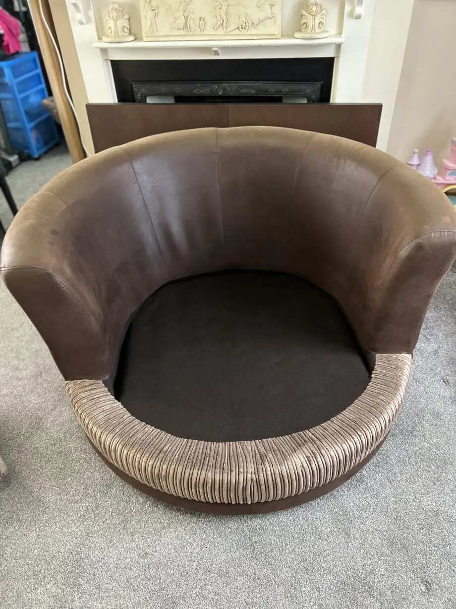 DFS Brown Swivel Cuddle Chair