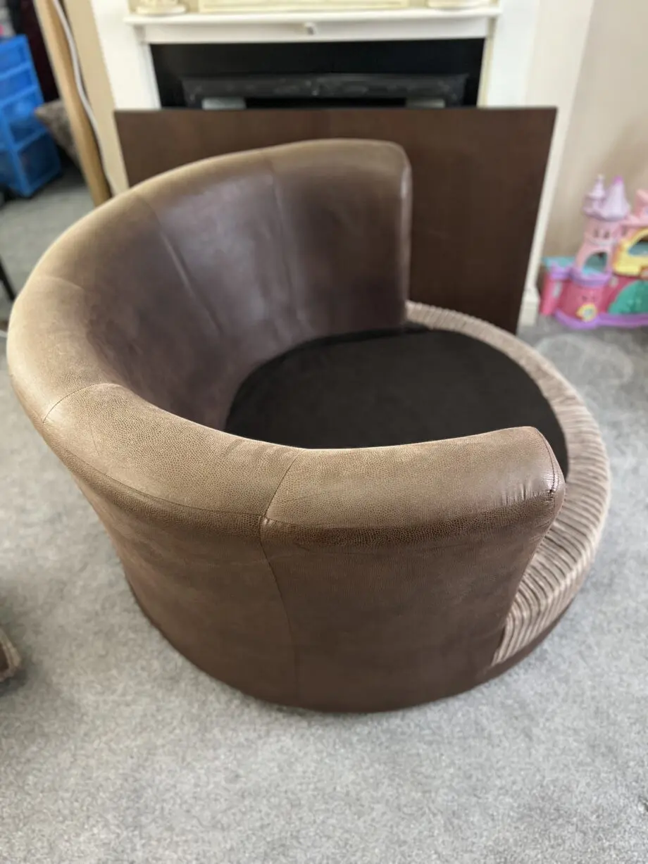 DFS Brown Swivel Cuddle Chair