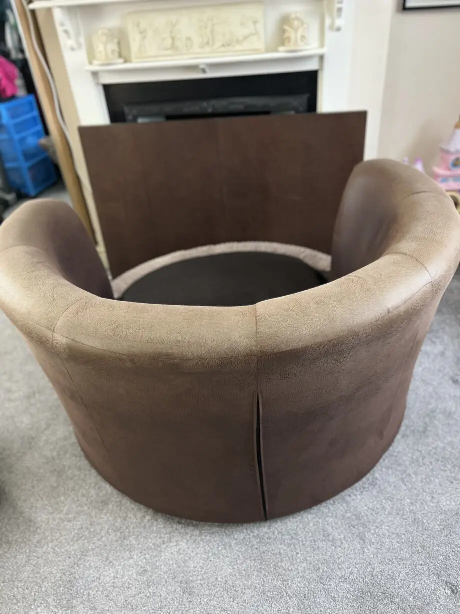 DFS Brown Swivel Cuddle Chair