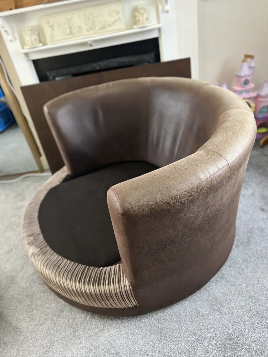 DFS Brown Swivel Cuddle Chair