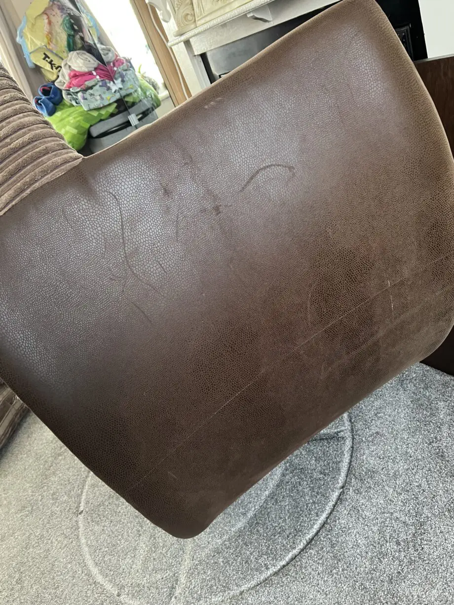 DFS Brown Swivel Cuddle Chair