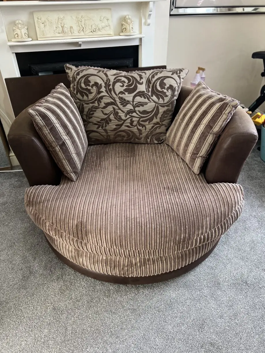 DFS Brown Swivel Cuddle Chair