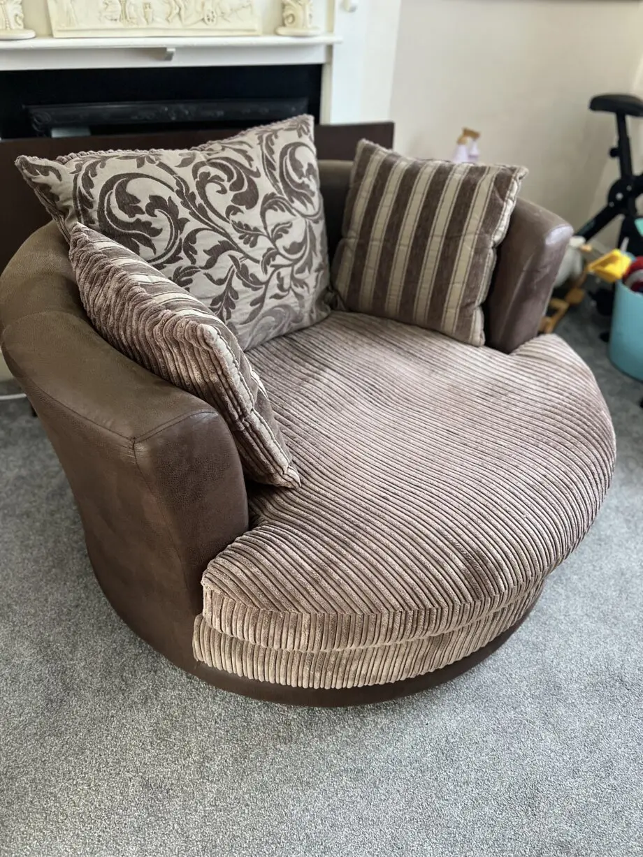 DFS Brown Swivel Cuddle Chair