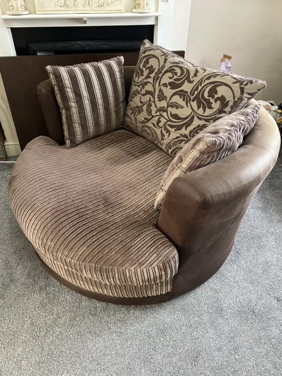 DFS Brown Swivel Cuddle Chair