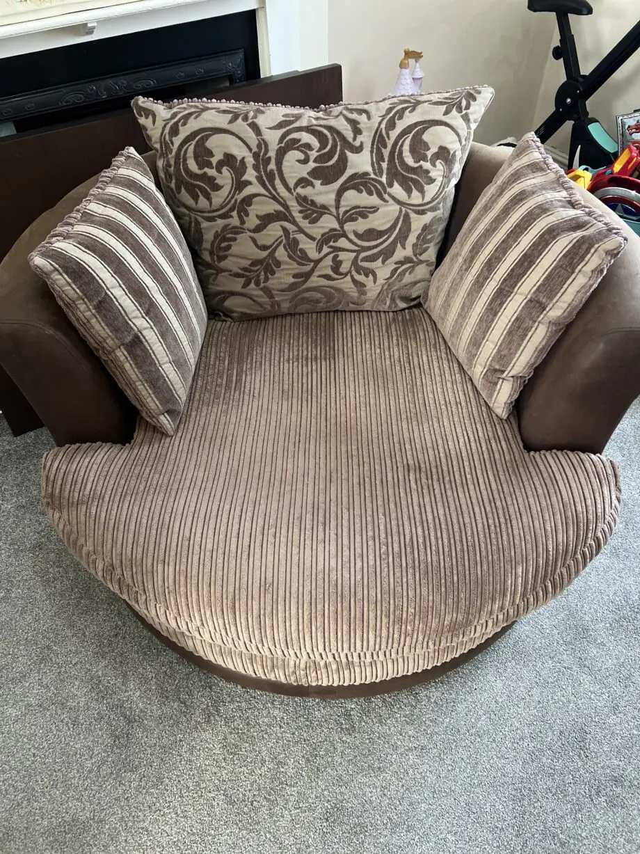 DFS Brown Swivel Cuddle Chair