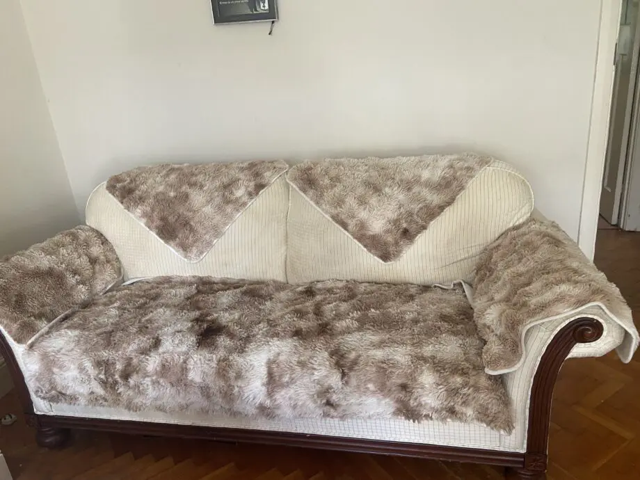 Sofa with additional top cover