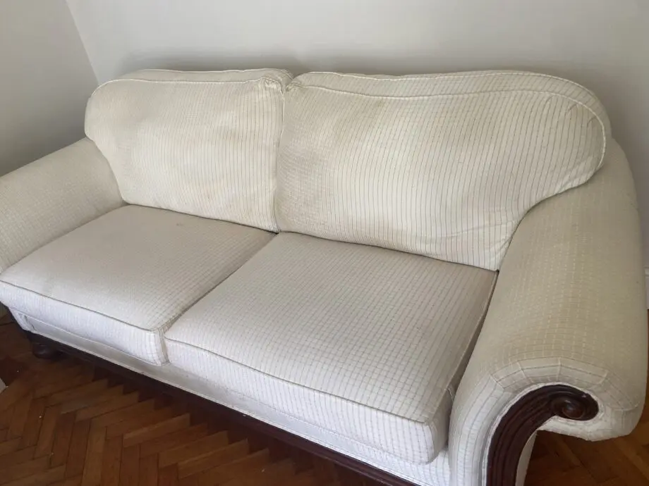 Sofa with additional top cover