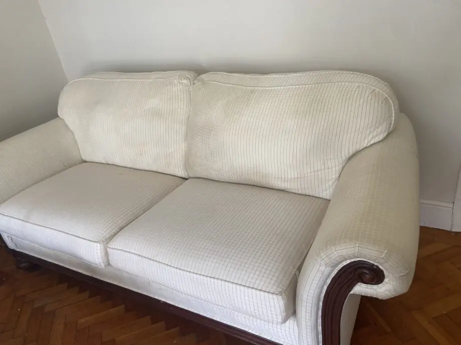 Sofa with additional top cover