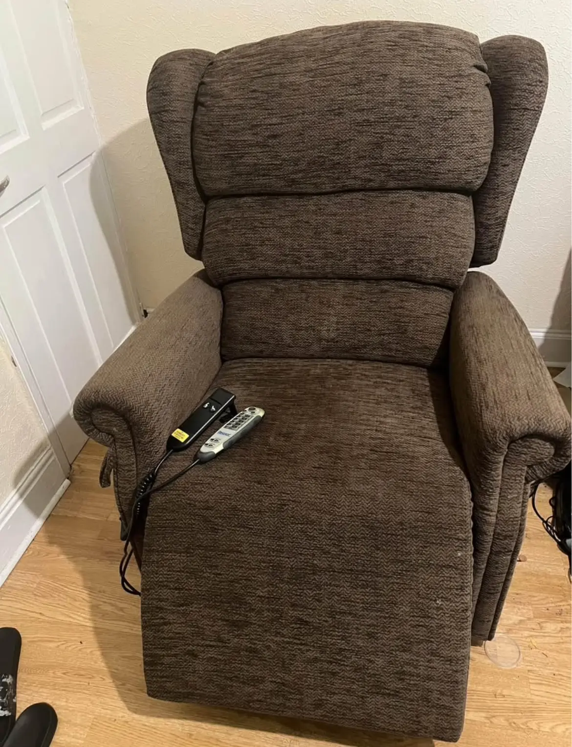 Brown electric heat and massage arm chair with lifting assist