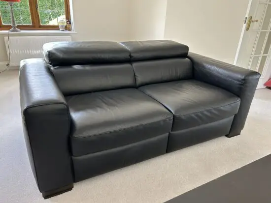 2 Genuine Natuzzi Black Leather Sofas – Excellent Condition