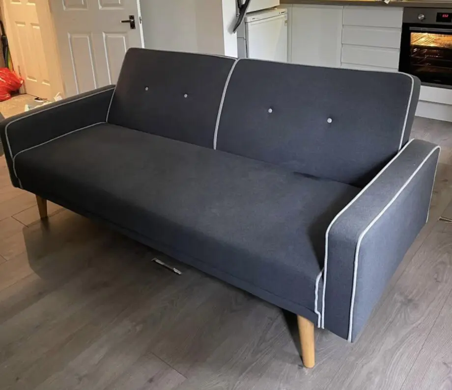 Grey sofa with wooden legs