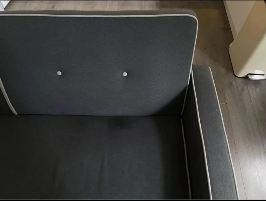 Grey sofa with wooden legs